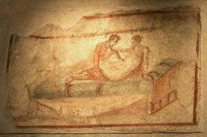 aprox. 74 d.c imagem encontrada em parede de bordel, na Pompéia.
